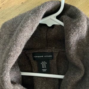 Crossover wool sweater with rolled collar